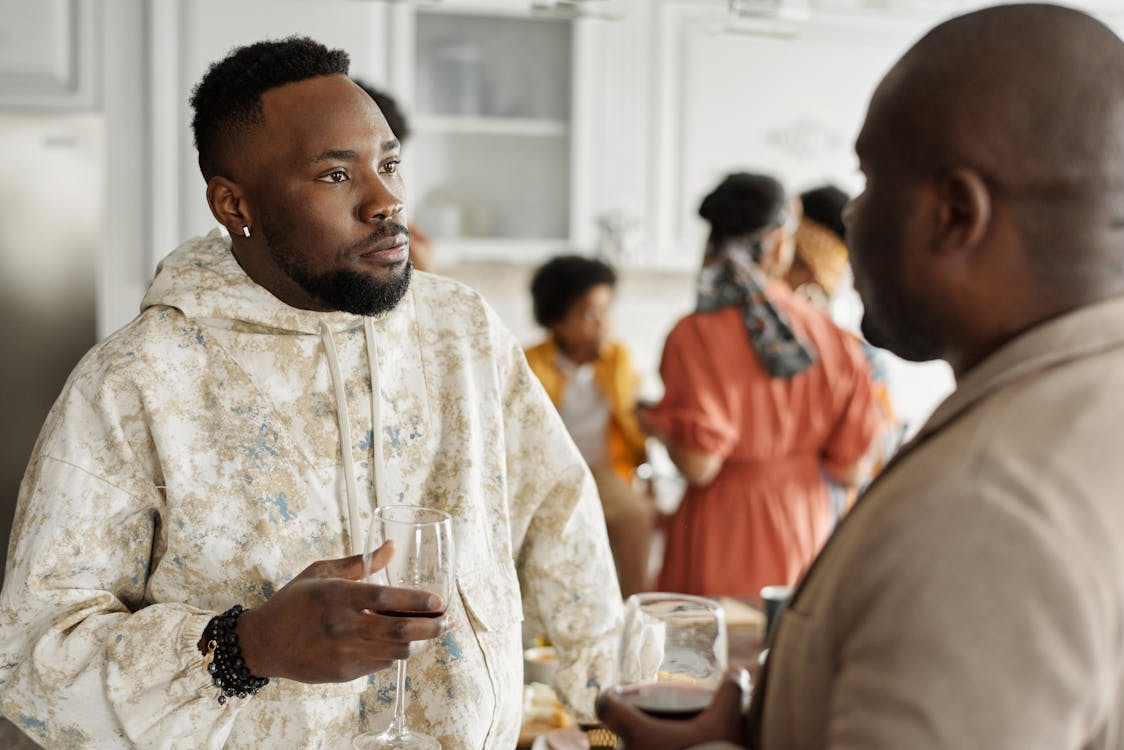 men drinking wine