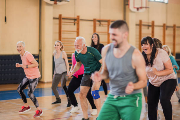 old people in group exercise class old people in group exercise class